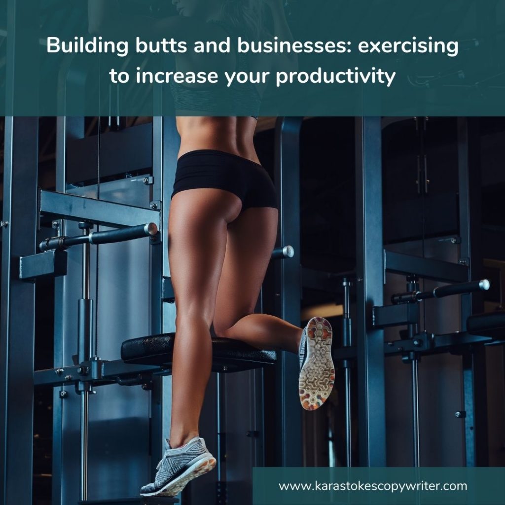 Woman doing a chin-up, focus is on her bottom.