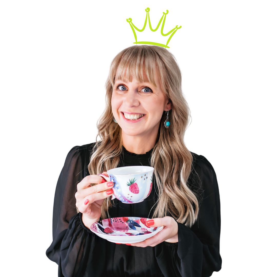 Coach holding coffee